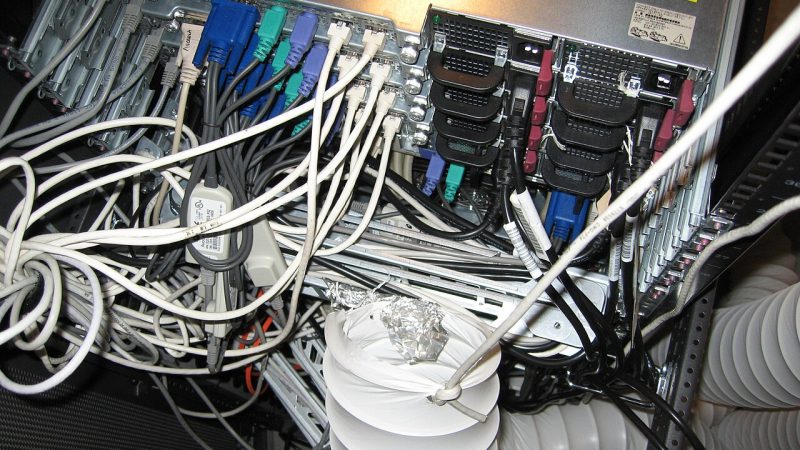 Server racks and cabling in a computer room
