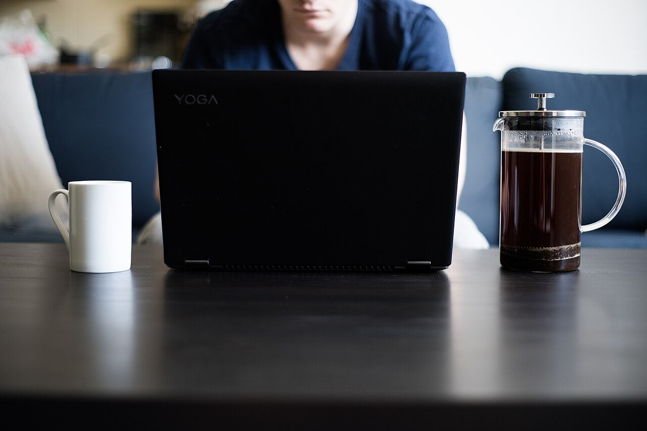Laptop and coffee on a desk